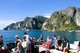 Thailand: Tourists on the Krabi-Phi Phi ferry at the busy pier in Tonsai Bay, Tonsai Village (Ban Ton Sai), Ko Phi Phi Don, Ko Phi Phi